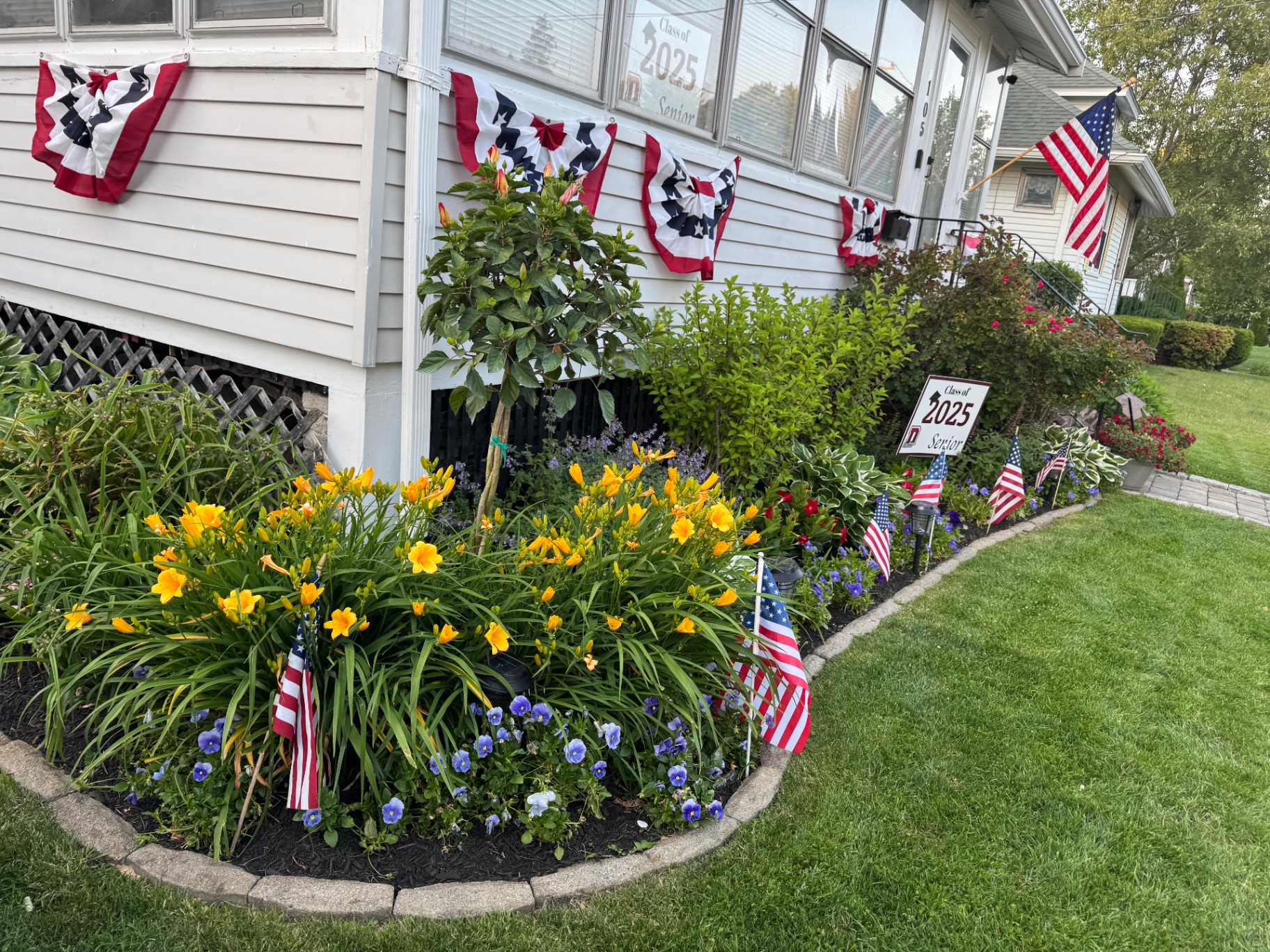 Colorful planting bed detail at a Dedham home